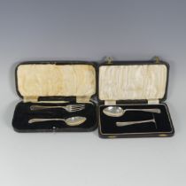 A cased George V silver Spoon and Pusher, the spoon Birmingham 1935, pusher Sheffield, 1922,