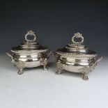 A pair of early 19thC Old Sheffield Plate Sauce Tureens, of oval form with shell capped handle and