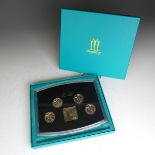 A Royal Mint 2002 Manchester Commonwealth Games Commemorative Coin Set, with four proof £2 Coins and