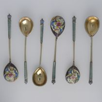 A set of six Russian silver gilt and enamelled Spoons, four 88 zolotniki, two marked 84, 11cm long,