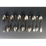 A harlequin set of eleven 19thC silver fiddle pattern Dessert Spoons, three William Chawner II