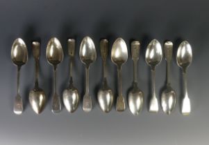 A harlequin set of eleven 19thC silver fiddle pattern Dessert Spoons, three William Chawner II