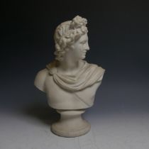 An early 20thC Parian bust of a Classical Male, modelled in draping robes, raised on plinth, H 29cm.