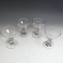 A matched set of four 19thC glass Rummers, with ring neck stems, bowls of varying sizes, H 13cm (4)