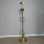 A Victorian brass standard Lamp, later fitted with electricity, H 150 cm.