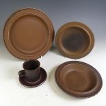 Arabia, Finland; a ruska brown stoneware Dinner and Tea Service, comprising ten Dinner Plates,