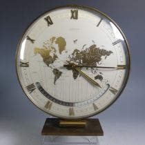 A mid-20thC Kienzle automatic electric world time Clock, the 10" dial over a twenty-four hour