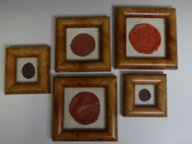 A reproduction framed Seal of 'The Sheriff of Exeter', together with four other reproduction Seals