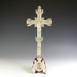 A 19th century Jerusalem mother of pearl and olive wood Crucifix, carved mother of pearl figure of