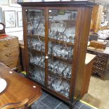 An Edwardian mahogany astragal glazed Bookcase, W 127 cm x H 161 cm x D 34 cm.