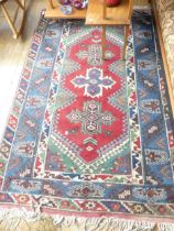 Tribal Rugs: an old Turkish hand knotted wool rug, the whole woven with bold geometric patterns in