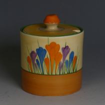 A Clarice Cliff 'Crocus' pattern lidded Pot, of second quality, H 10cm.