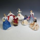 A small quantity of Royal Doulton Figures, to comprise Christmas Day 2002 HN4422, Helen HN3601, Sara