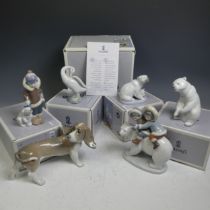 A Lladro porcelain Group of 'Eskimo Riders', factory marks to base, boxed, together with a