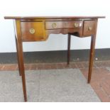 A Georgian mahogany bow fronted dressing Table, fitted with a series of drawers and kneehole recess,