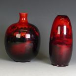 A Royal Doulton red flambe globular Vase, painted with cottages in wooded landscape, printed marks