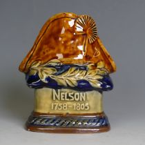 A Royal Doulton stoneware commemorative Candle Holder, for Nelson, with hat and inscription '