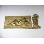 A 19thC Gilt bronze plaque/panel Italian, depicting in relief a recumbent Putti, set against a