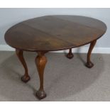 A 19thC oval drop-leaf dining Table, raised on cabriole legs upon claw and ball feet, W 108 cm x H