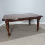 A Victorian style mahogany extending dining Table, with additional leaf, W 210.5 cm x H 76 cm x D