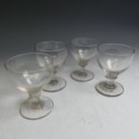 A matched set of mid 19thC glass Rummers, c. 1835, one with engraving to bowl reading 'W. W 1832'