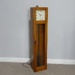 A 1950's 'Gents of Leicester' electronic Clock, W:29cm x H:128cm x D:18.5cm.