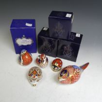A small quantity of Royal Crown Derby Paperweights, to comprise 'Bramble' with gold stopper,