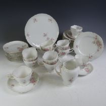 An antique Austrian part Tea Set, c.1897 - 1905, comprising eleven Tea Cups, twelve Saucers, one