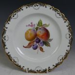 A Meissen porcelain Cabinet Plate, with central depictions of fruit and flora within gilt shell