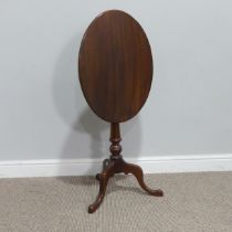 An Antique oval tilt-top Tripod Table, W 56 cm x H 68.5 cm x D 41 cm, together with a vintage carved