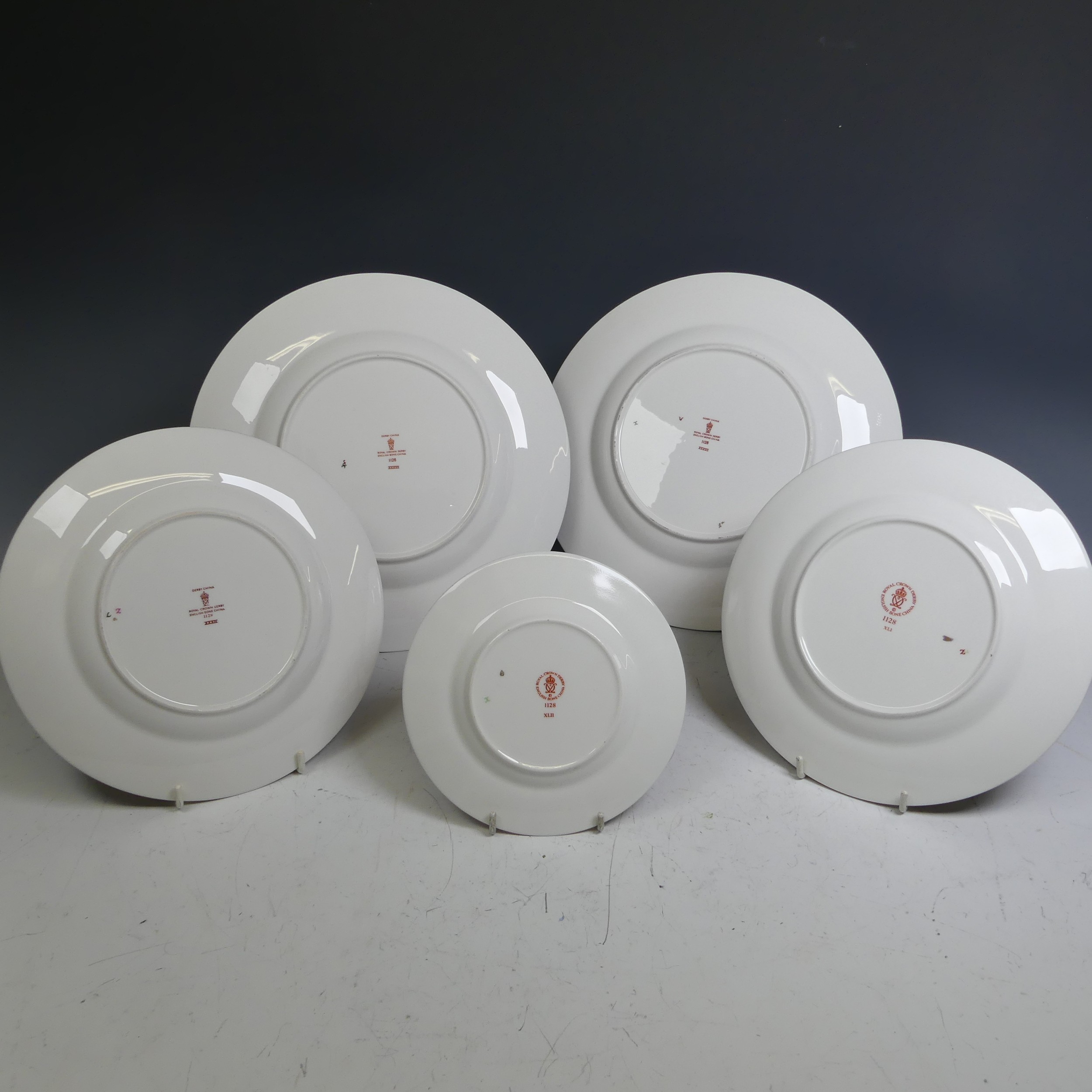 A quantity of Royal Crown Derby 1128 pattern Pieces, comprising two large Dinner Plates, two smaller - Image 6 of 25