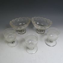 A matched set of three antique moulded glass Rummers, H 13cm, together with a pair of cut glass