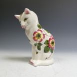 A Wemyss pottery Cat, marked for Exon pottery, Bovey Tracey, decorated in floral sprays, marks to