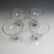 A matched set of four Georgian glass Rummers, with knopped stem, somewhat varying in terms of bowl