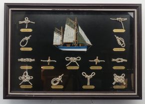 A cased display of Boating knots, in glazed frame, overall 46cm x 66cm.