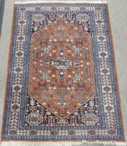 Tribal Rugs; a Persian Qashqai Rug, light brown ground, wool pile on cotton base, 184cm x 130cm.