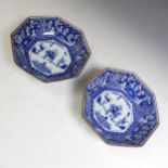 A pair of 20thC Chinese blue and white octagonal Bowls, with central depictions of three figures