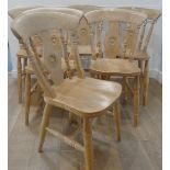 A set of six Antique ash 'bullseye' farmhouse kitchen Chairs, raised on turned supports, W 51 cm x H