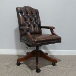 A Button-back swivel desk Chair, W 65 cm x H 99 cm x D 65 cm.