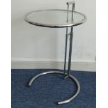 A Mid-20thC circular chrome and glass adjustable Table, W 51 cm x H 81 cm x D 50.5 cm, (lowest