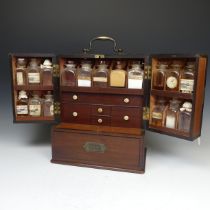 A 19th century apothecary travelling medicine Box, with brass carrying handle to top, the hinged