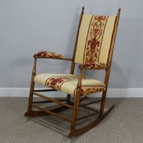 A 19th century Shaker Rocking Chair, with Art Nouveau inspired upholstery to the back, seat and