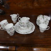 A Susie Cooper 'Wild Strawberry' pattern Coffee Set, comprising eight Coffee Cups and six Saucers,