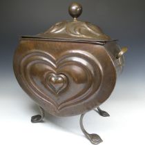 An Art Nouveau hammered copper heart shaped Coal Box, front marked with 'Rd 406450', W 40 cm x H