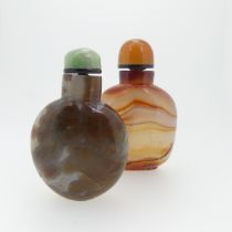 A Chinese macaroni agate Snuff Bottle, H 7.5cm, together with another Chinese agate Snuff Bottle,