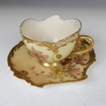 A Royal Worcester blush ivory Cup and Saucer, shape 1471, the cup and the saucer with moulded and