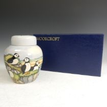 A Moorcroft pottery 'Puffins' pattern Ginger Jar, tube lined decoration of puffins amongst seascape,