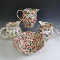 An Emma Bridgewater 'Polka Folk' pattern Jug, sponged in colourful patterns, factory marks to