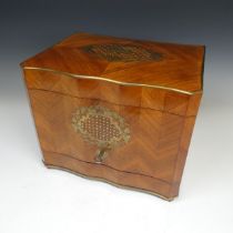 An Early 20th century French kingwood Tantalus, of serpentine shape and with brass and mother of