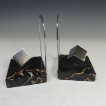 A Pair of Art Deco marble Bookends, with aluminium hoop backs and central cube, W 9 cm x H 13.5 cm x